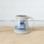 Rowe Pottery Hand thrown stoneware mug In a hand decorated pumpkin pattern