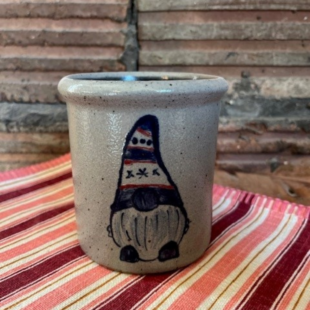 Rowe Pottery handmade stoneware candle crock in a hand decorated gnome pattern