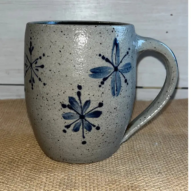 Rowe Pottery Hand thrown stoneware mug In a hand decorated snowflake pattern
