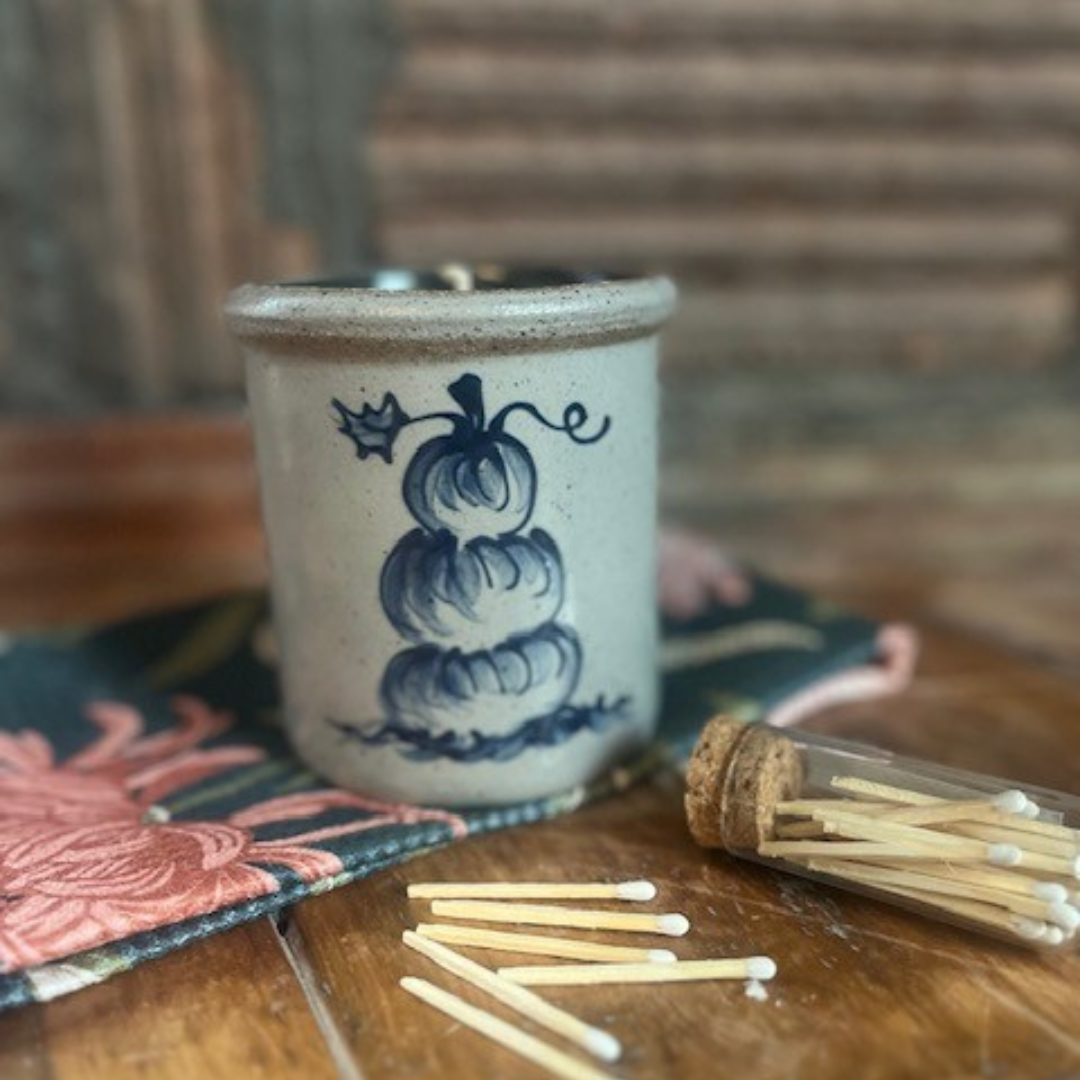 Rowe Pottery handmade stoneware candle crock in a hand decorated stacked pumpkin pattern