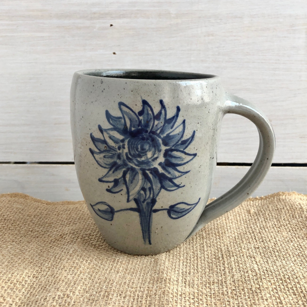 Rowe Pottery Hand thrown stoneware mug In a hand decorated sunflower pattern